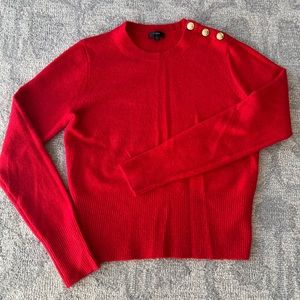 Red J. Crew sweater with gold button detail at shoulder, size M